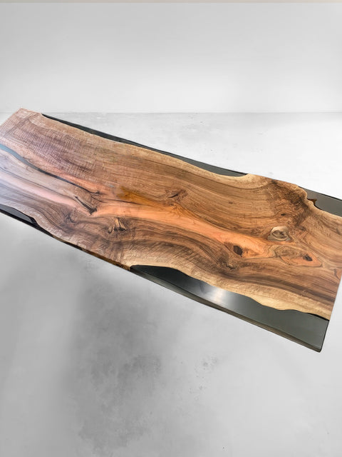 Epoxy table from walnut with smoky resin and live edge Luminoso