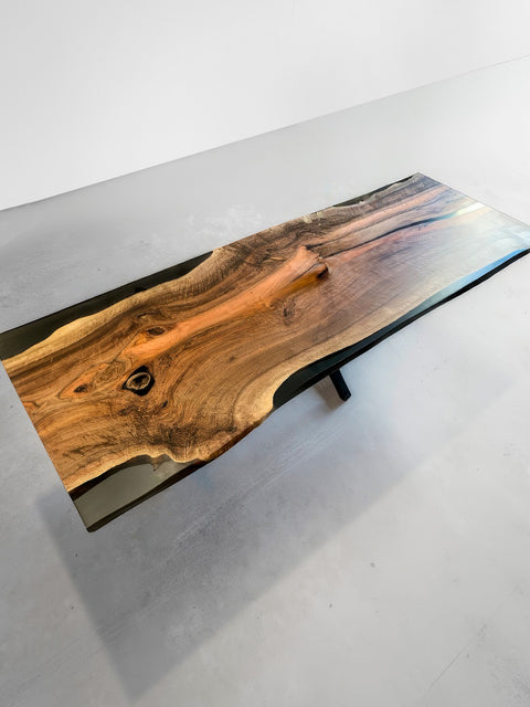 Epoxy table from walnut with smoky resin and live edge Luminoso